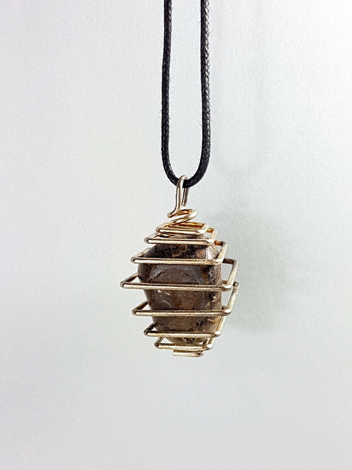 colgante ojo tigre jaula