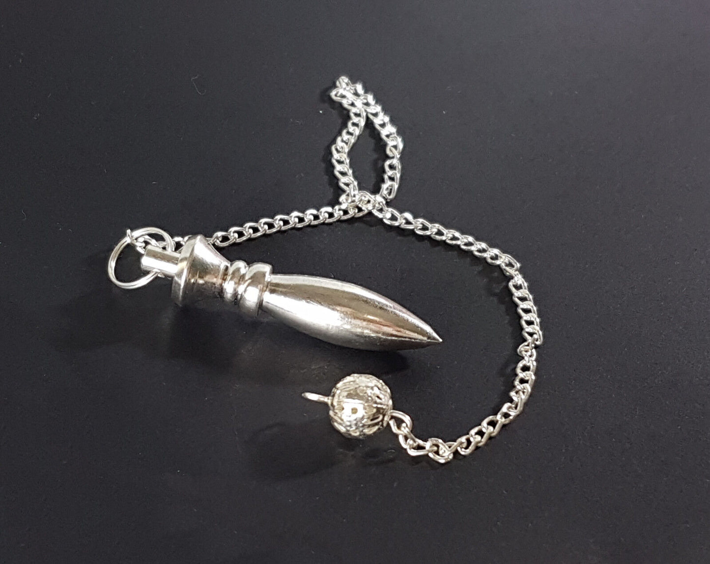 pendulo karnak plateado