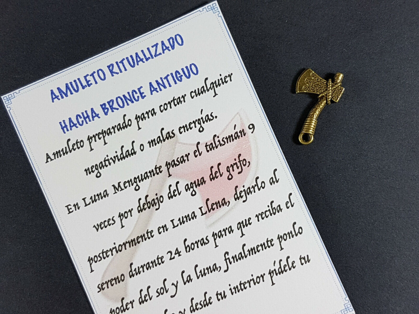 amuleto hacha bronce