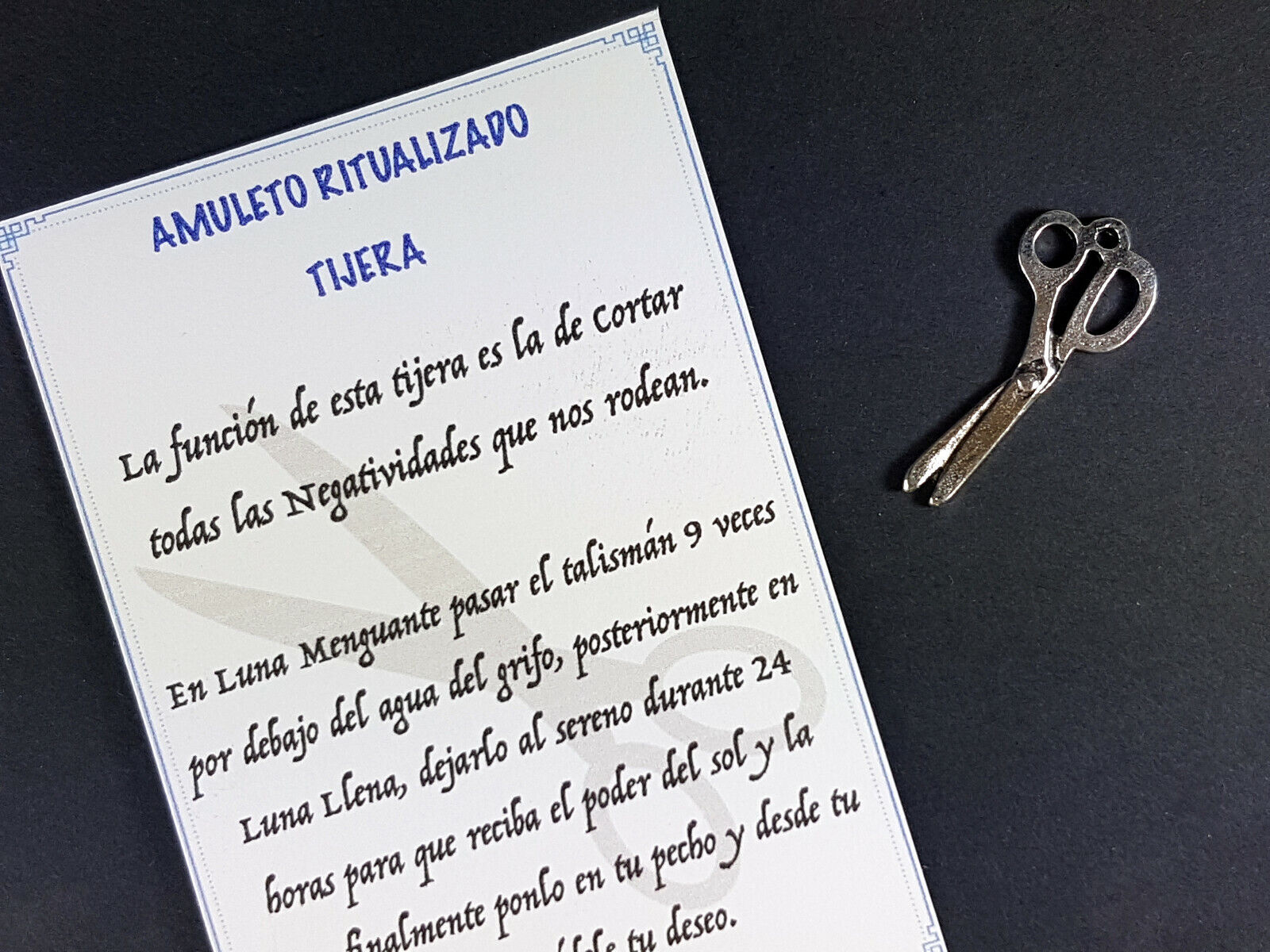 amuleto tijera corta negatividad